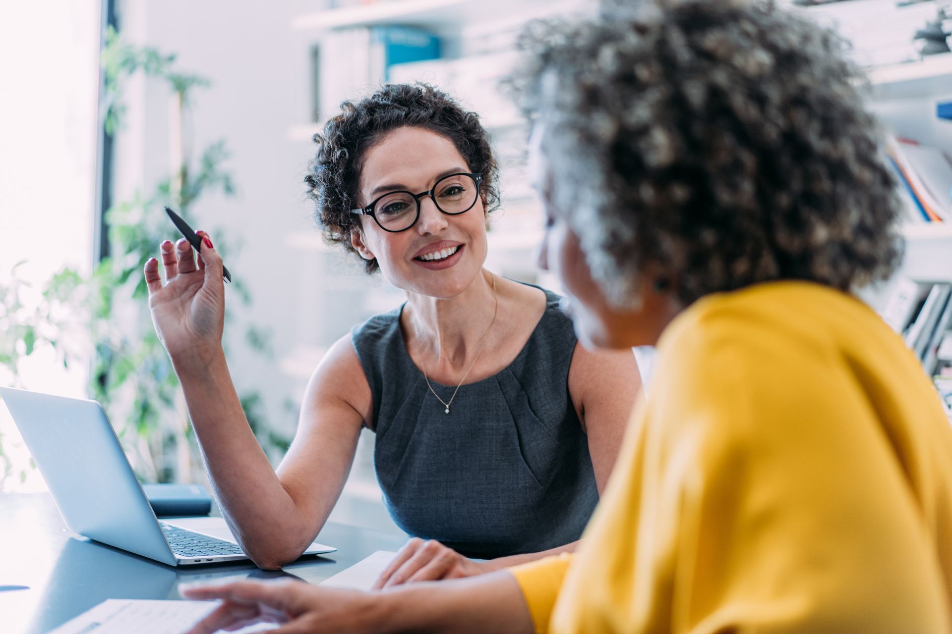 A lawyer consulting with a client in an office setting, symbolizing professional legal guidance for slip and fall lawsuits.