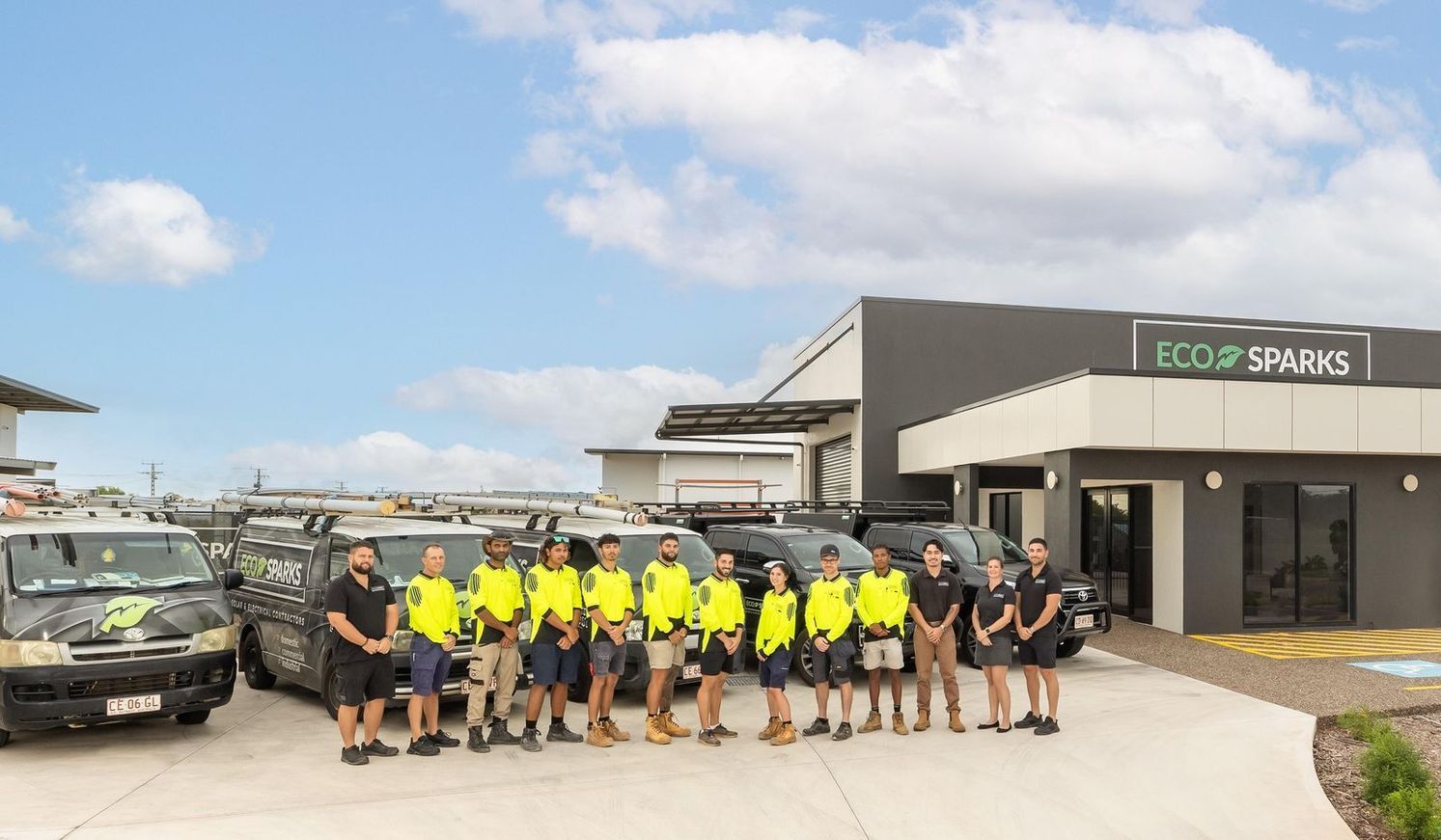 Employees Outside Building — Eco Sparks Solar & Electrical Contractors in Berrimah, NT
