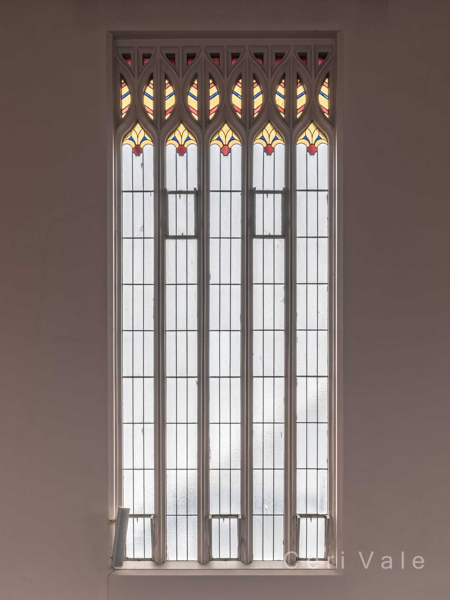 A picture of a stained glass window taken by lori vale