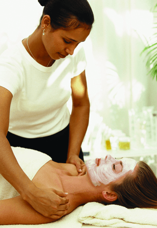 Woman relaxing with a face mask applied