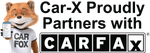 Car-X partners with Carfax: fox holds phone with data, wears 