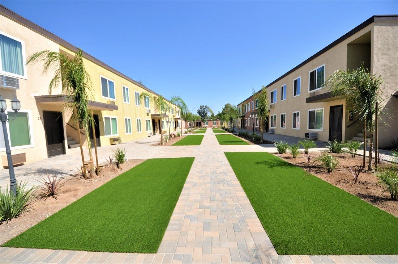 Village Green Apartments with grass