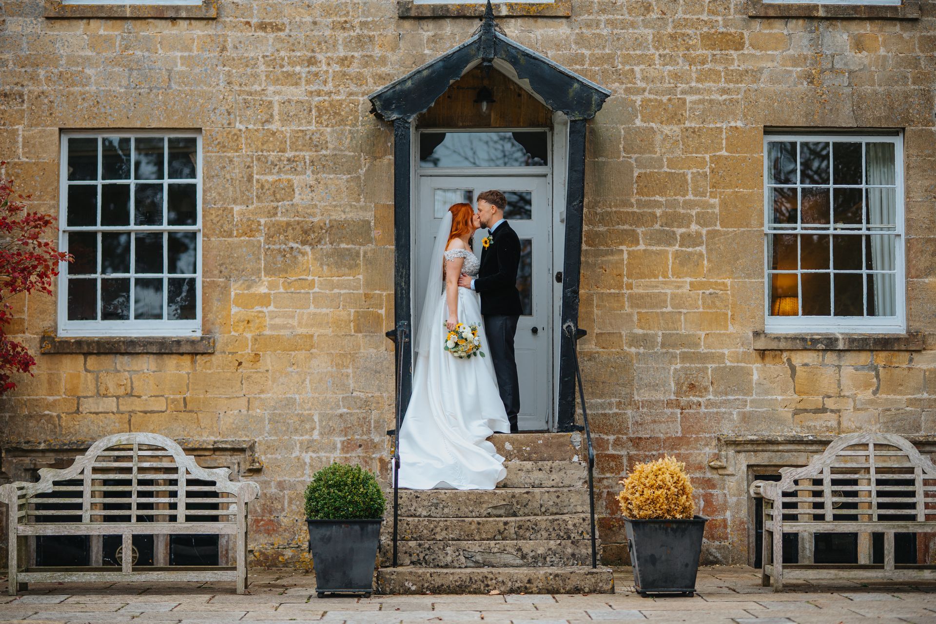 wedding couples portraits outside Manor House at lapstone barn 