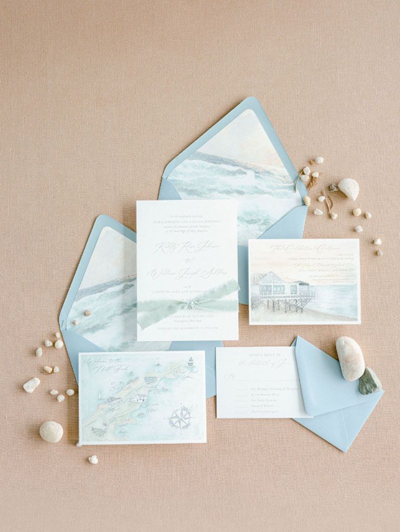 Wedding invitation suite, light blue and beige watercolor design with seashells.