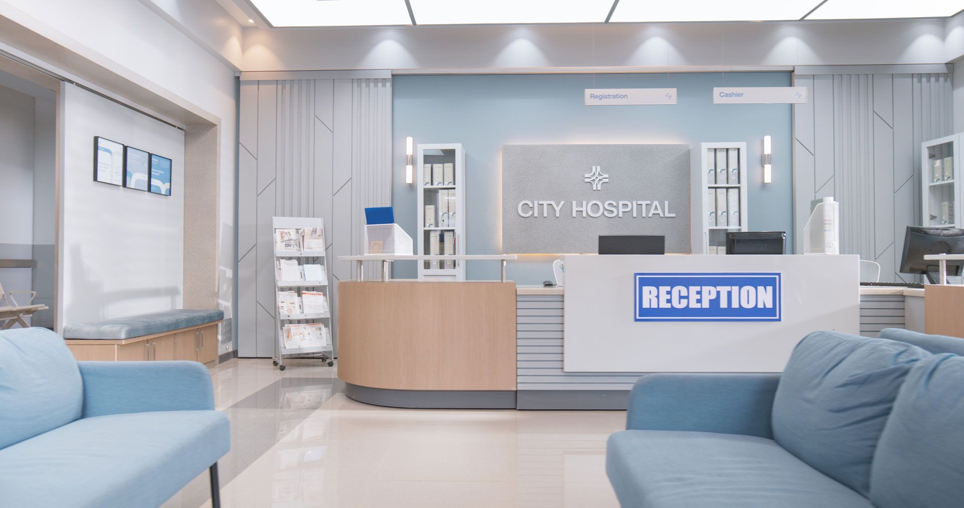 Hospital reception area with blue and beige decor, 