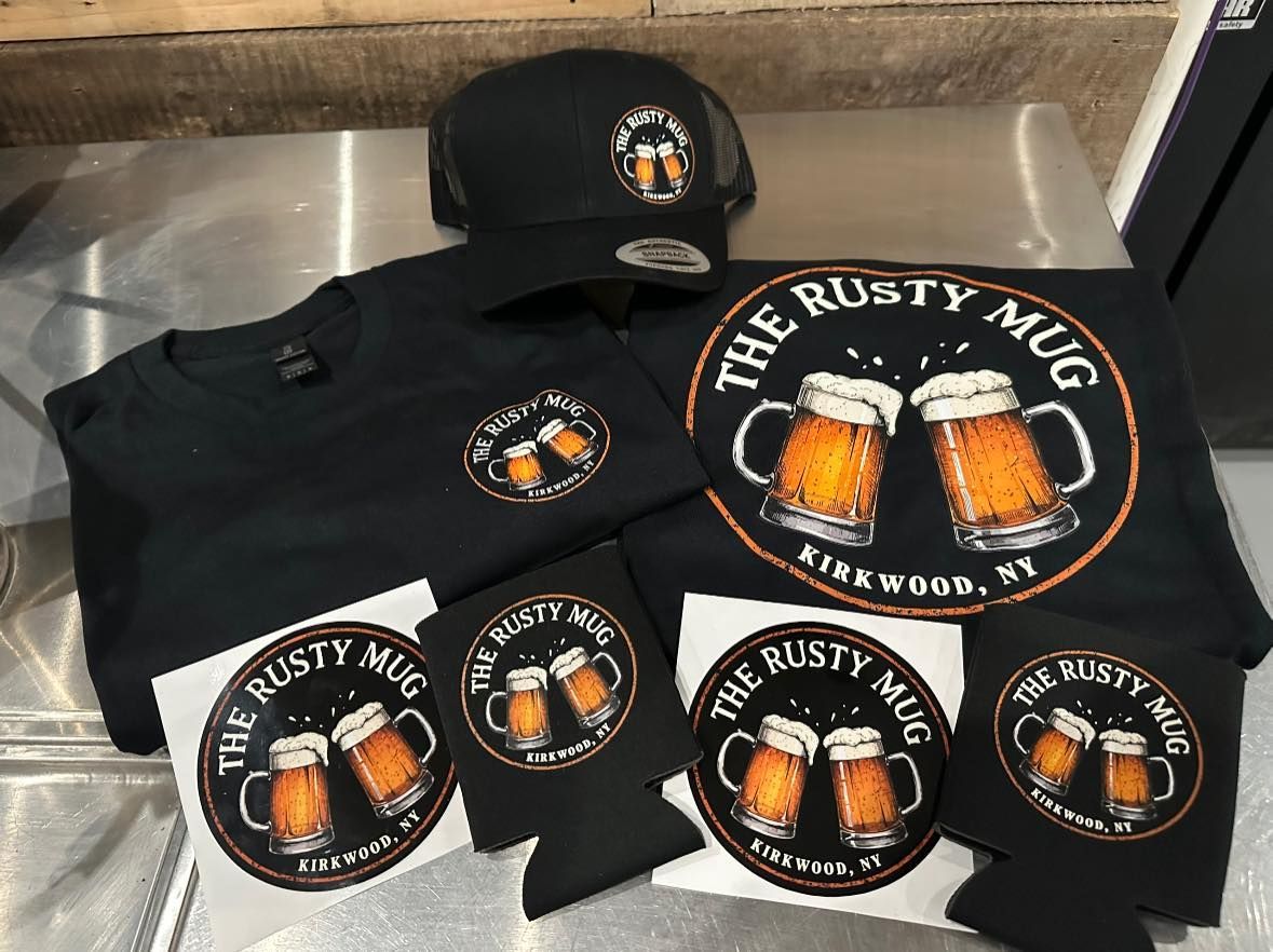 Black Rusty Mug merchandise: hat, shirts, and can coolers with logo of two beer mugs.