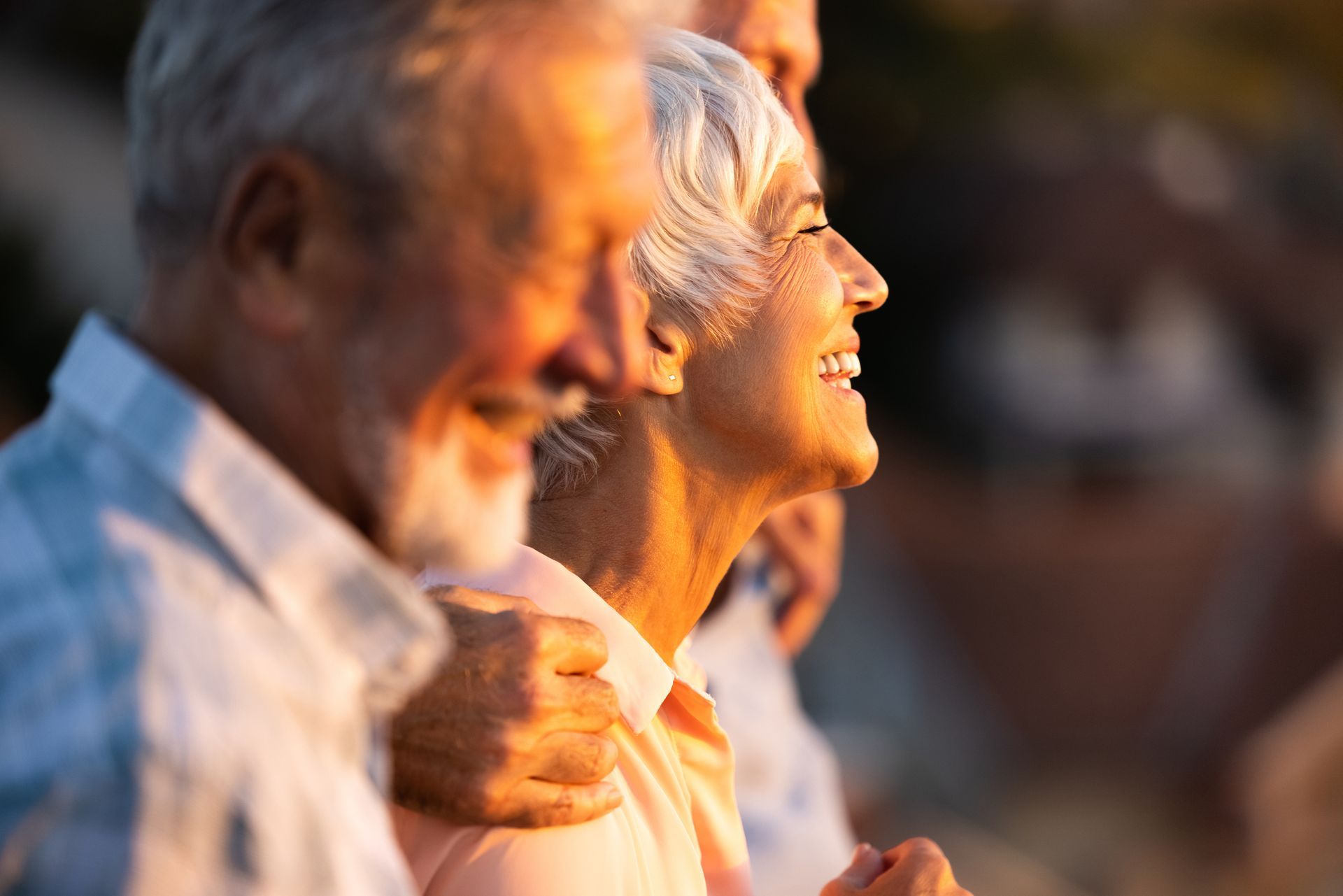 image of couple with sun on face