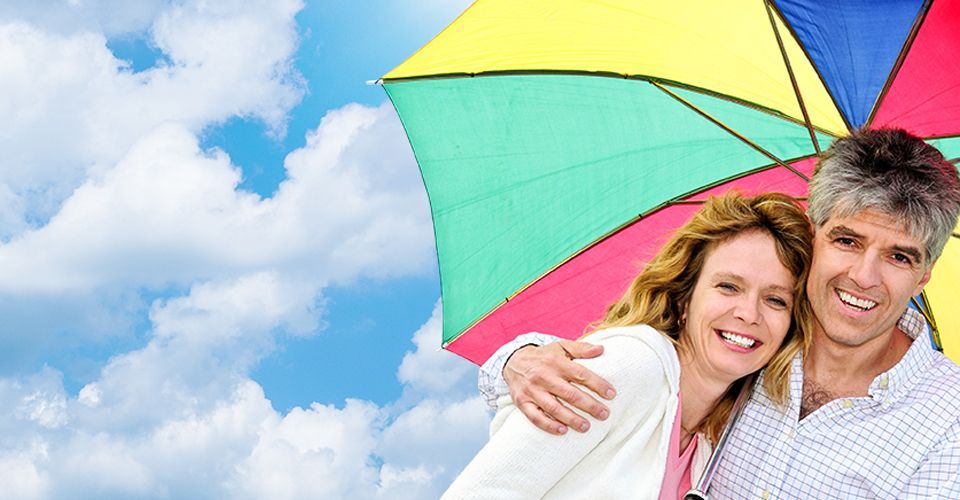 image of couple with umbrella