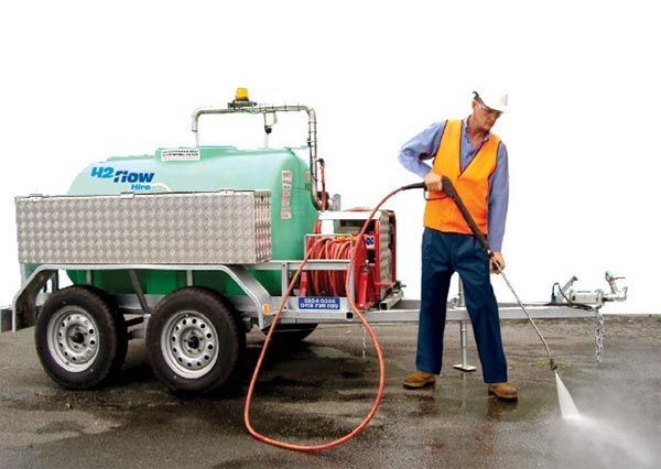 Go green for your next clean with a small pressure washer trailer