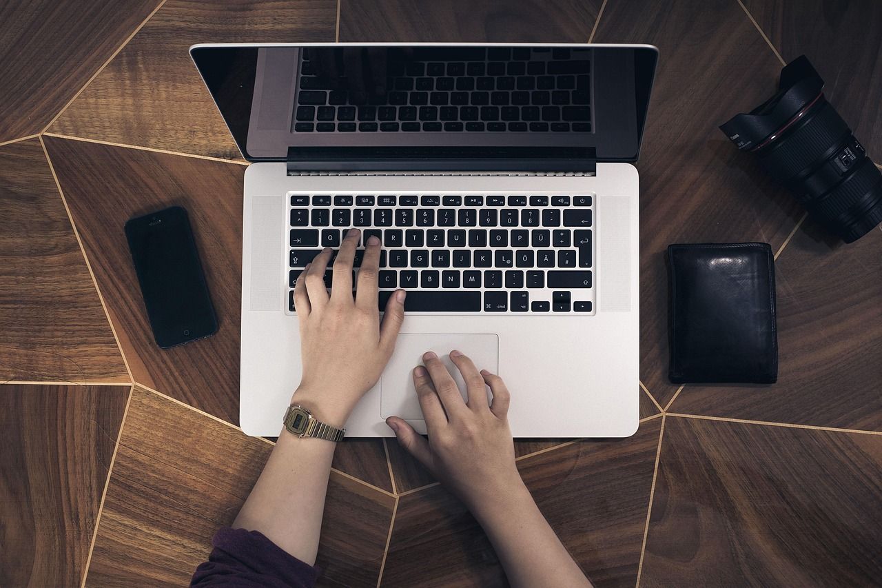 Laptop on a wooden desk