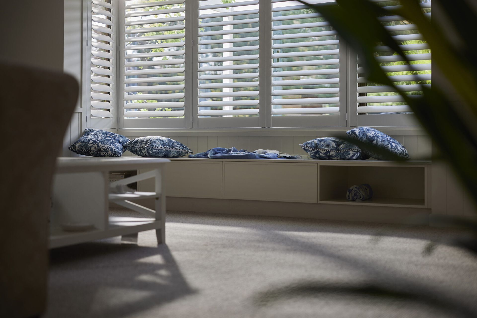 Living Room With White Shutters, a Coffee Table — LeSands Screens & Blinds Moss Vale Pty Ltd in Moss Vale, NSW