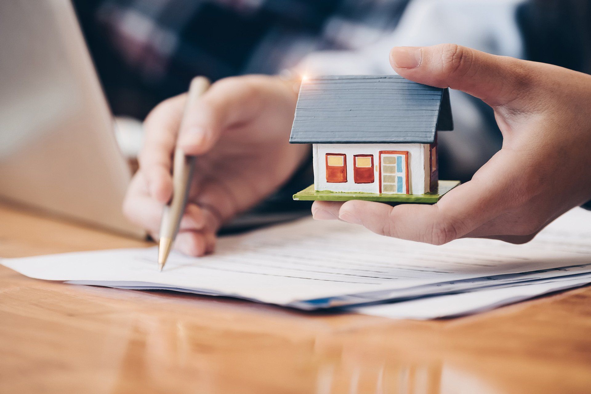 Close Up Real Estate Agent with House Model Hand Putting Signing Contract | Bacchus Marsh, Vic | Haines Conveyancing Close Up Real Estate Agent with House Model Hand Putting Signing Contract | Bacchus Marsh, Vic | Haines Conveyancing