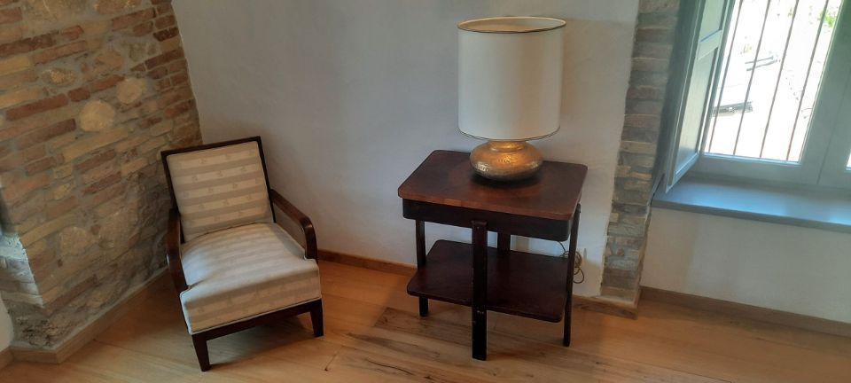 Camera b&b con poltrona