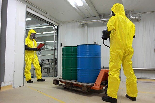 Man Monitoring of Drums - Hazardous Waste Removal in Denver, CO