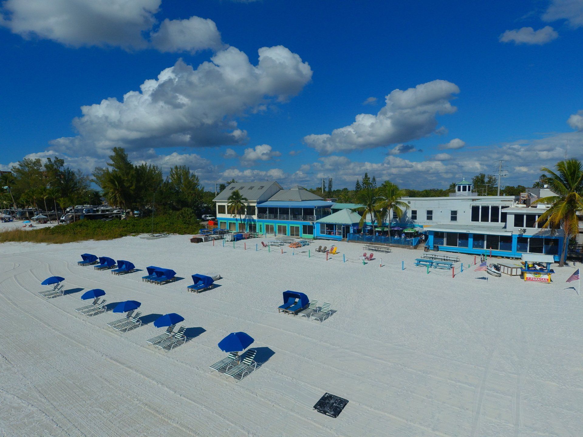 Top view of a blue cabana on the shore