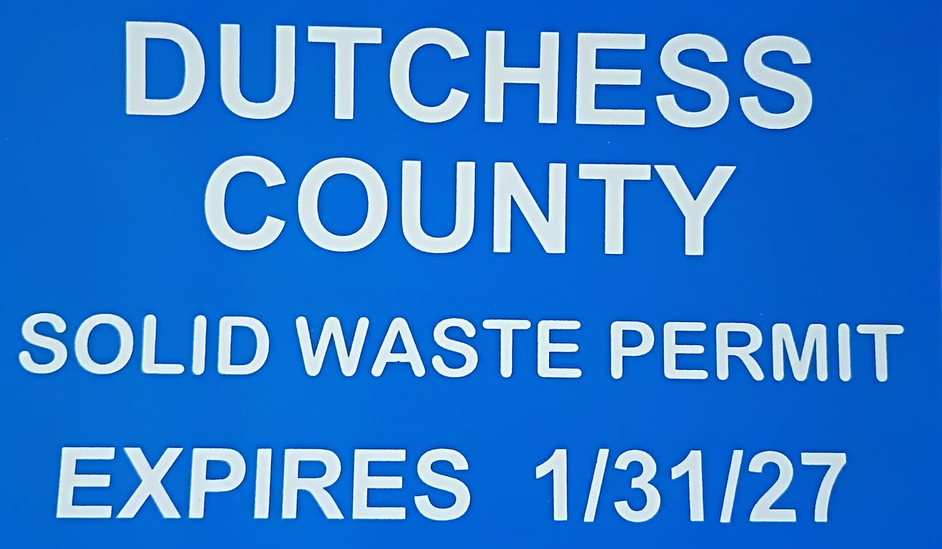 A blue sign with white text reading 