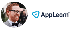 a man wearing glasses and a bow tie is standing in front of an apple learn logo .