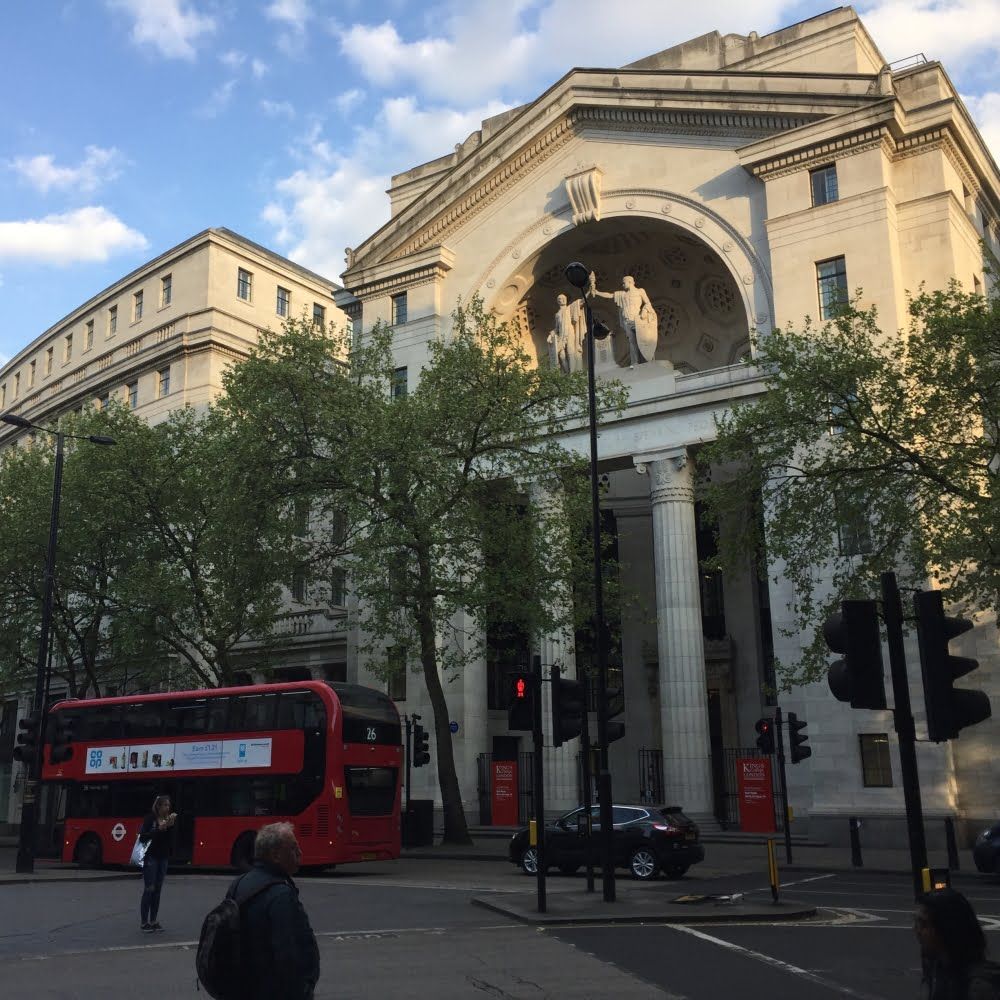 Kings College exterior with London bus in background