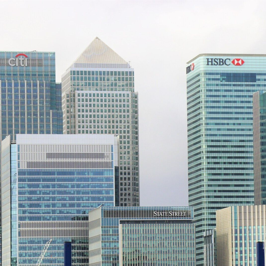 a city skyline with a hsbc building in the middle