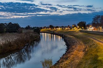 A River with Trees on The Shore at Night with Lights Reflected in The Water — DecoGlaze in Maitland, NSW