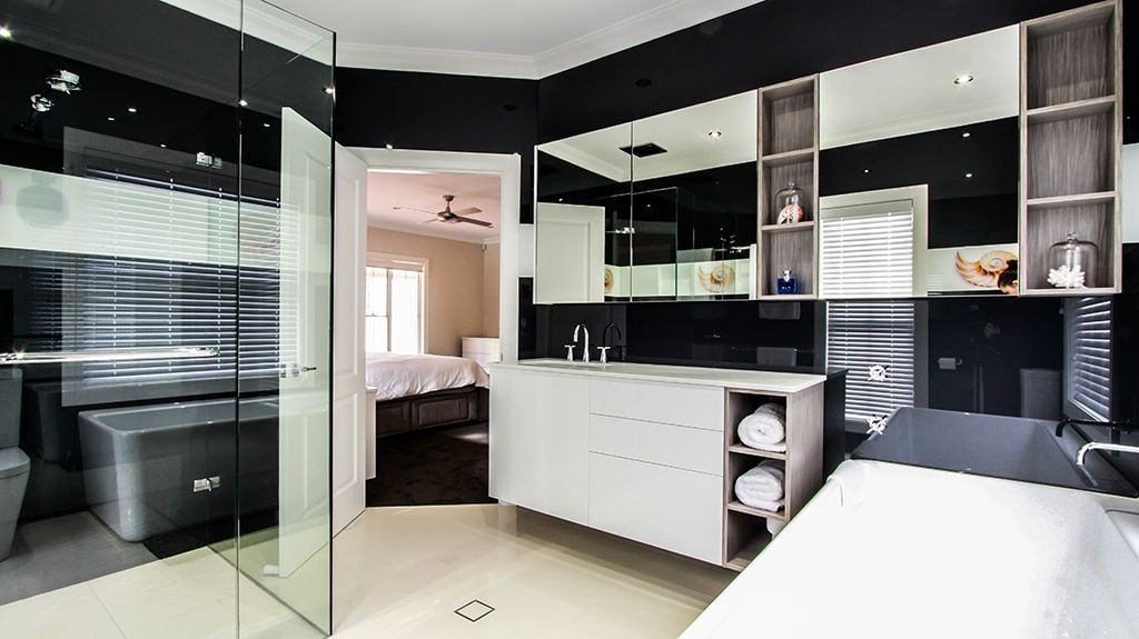 A Bathroom with A Bathtub and A Walk in Shower — DecoGlaze in Cardiff, NSW