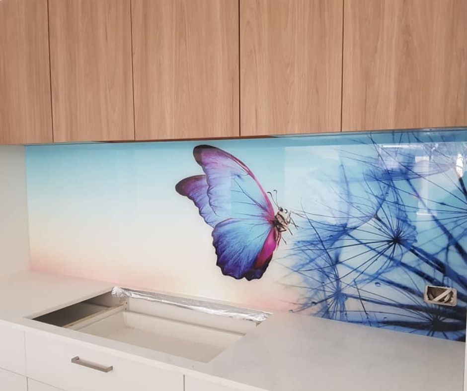 A Kitchen with A Butterfly and Dandelions on The Wall — DecoGlaze in Cardiff, NSW
