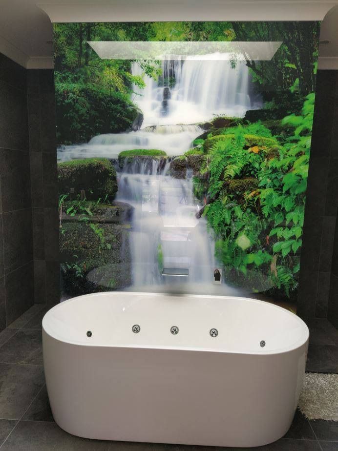 A Bathtub with A Picture of A Waterfall on The Wall Behind It — DecoGlaze in Cardiff, NSW