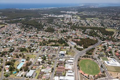 An Aerial View of A City with A Soccer Field in The Middle of It — DecoGlaze in Lake Macquarie, NSW