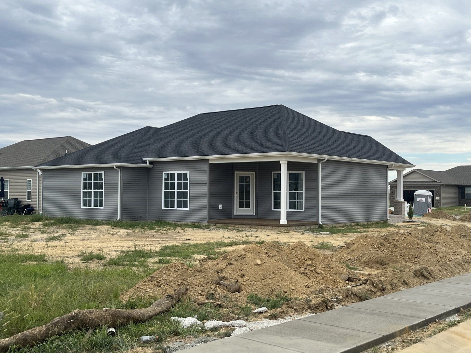 Gray House With Grass — Evansville, IN — Chapman Homes