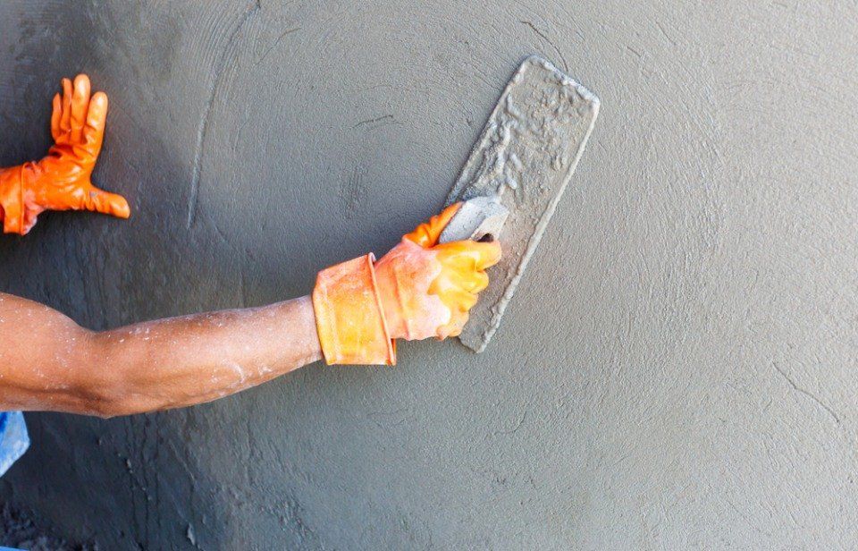 plastering the wall