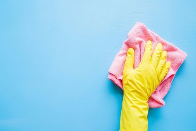 Employee Hand in Rubber Protective Glove — Bradenton, FL — Cleaning Butlers