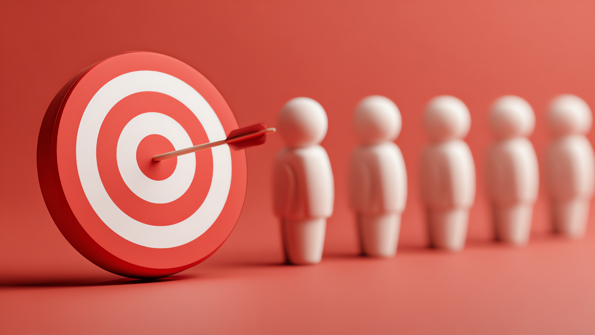 Red target with arrow in the center, with a line of small, white figures to the right.