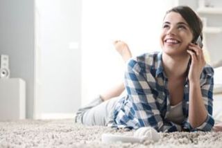 Woman on the phone in the living room - Vacuum living room - Oradell, NJ