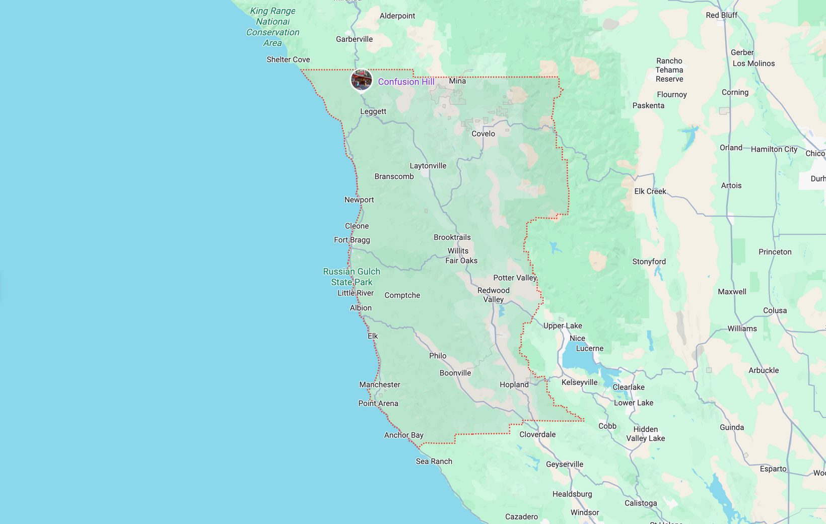 Map of the California coast, with a brown pin marking the location of a city.