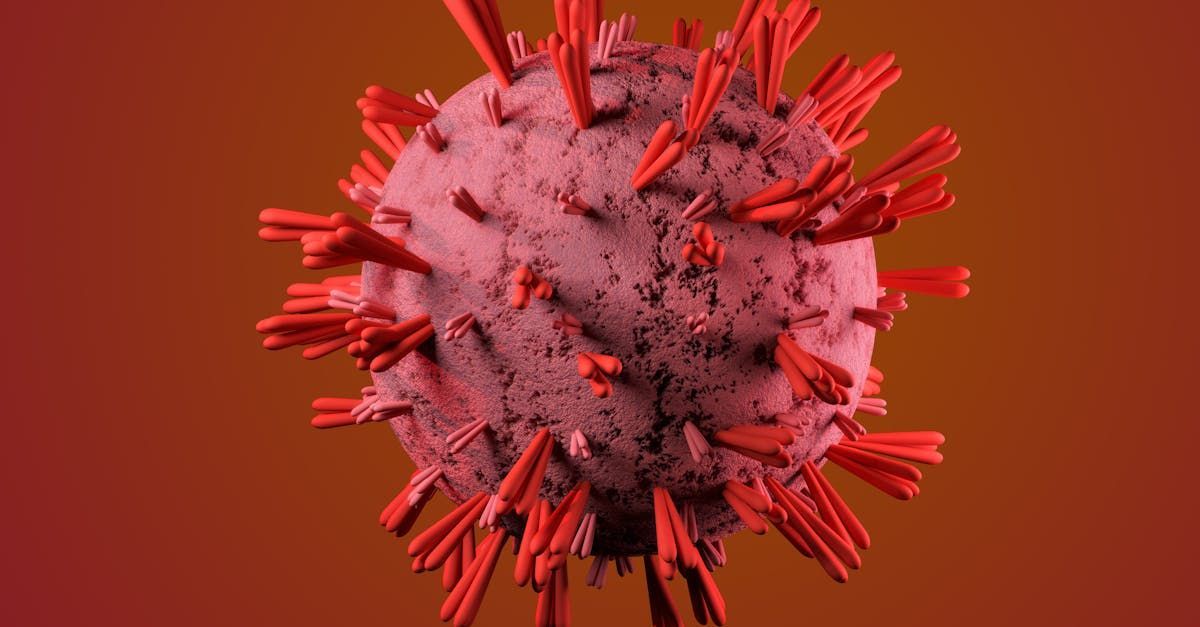 A close up of a virus with red spikes on a red background. anemia. iron supplement. macromed. pharmaceutical compnanies in lebanon. rabih hassouneh.