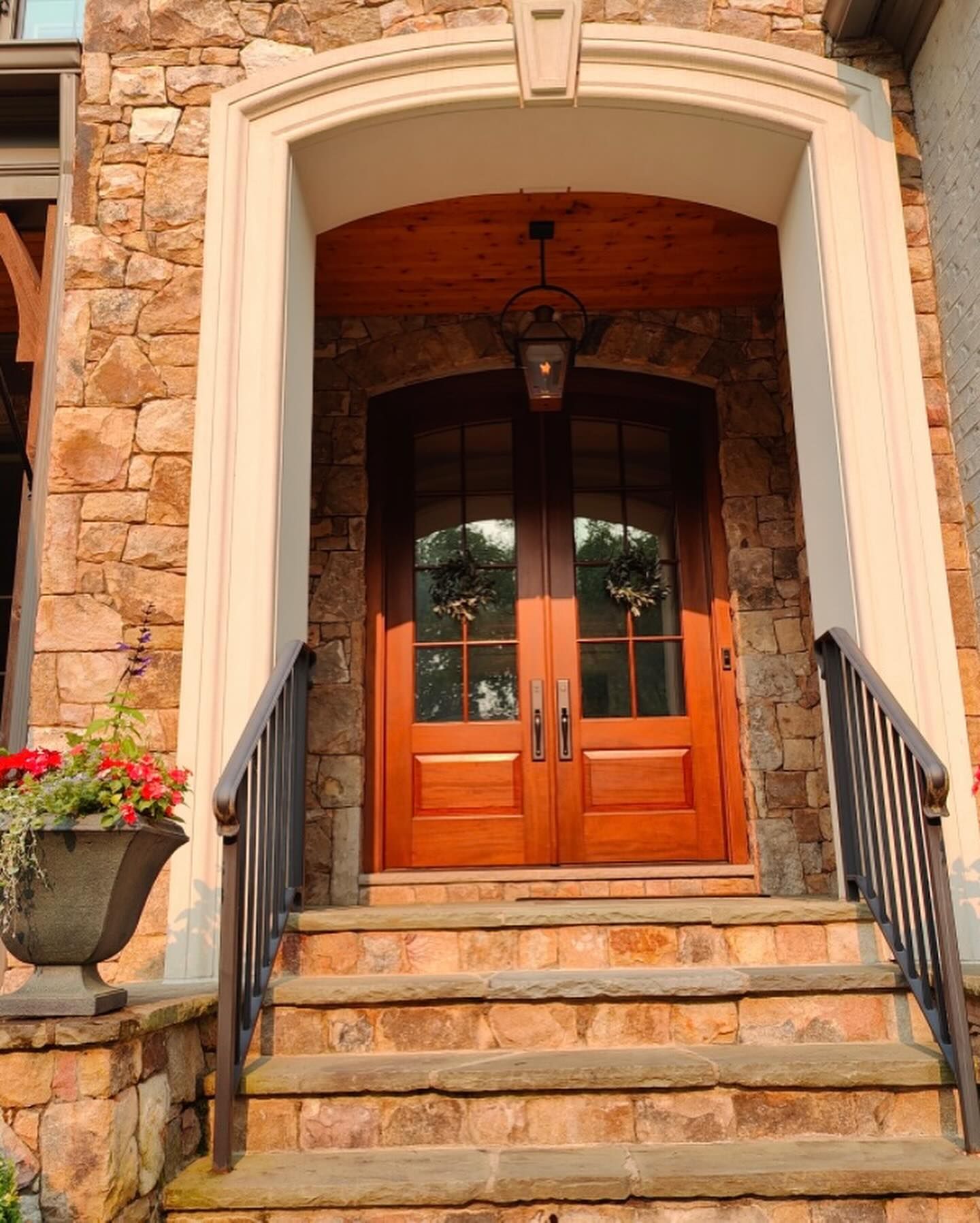 A front entrance with stone steps.