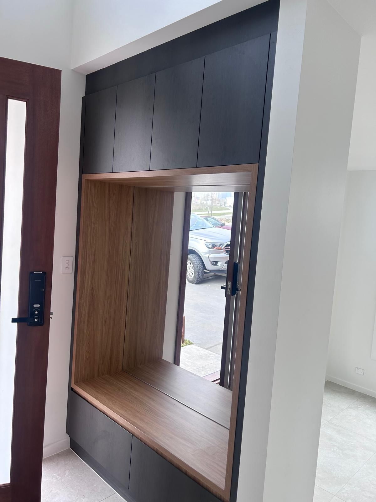 There is a mirror in the corner of the room.