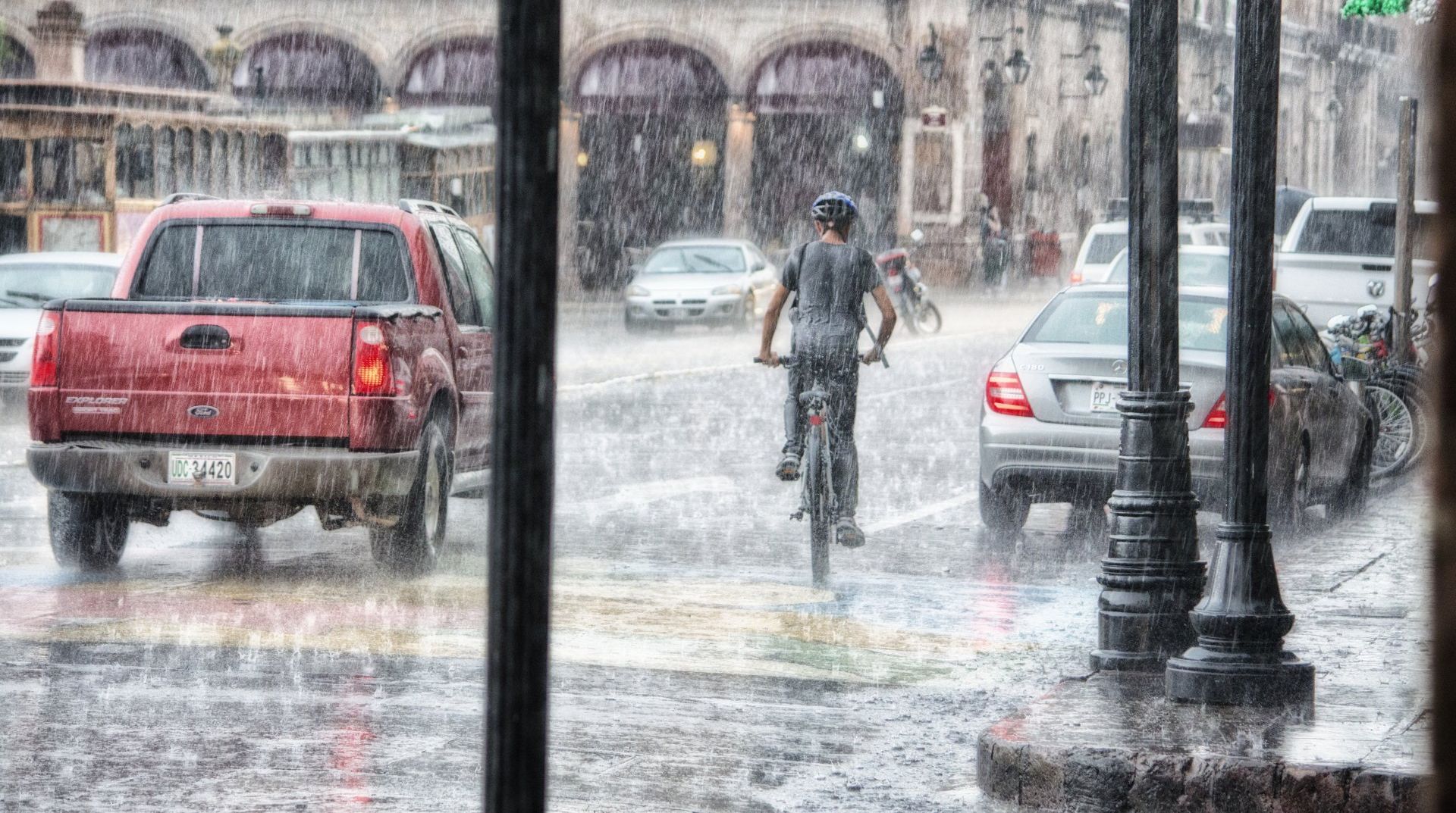 Heavy rain over city streets, risk of flooding