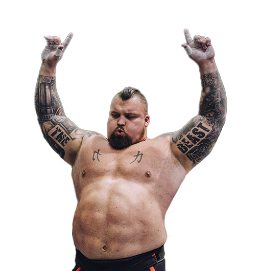 A man with tattoos on his arms is standing with his arms in the air.