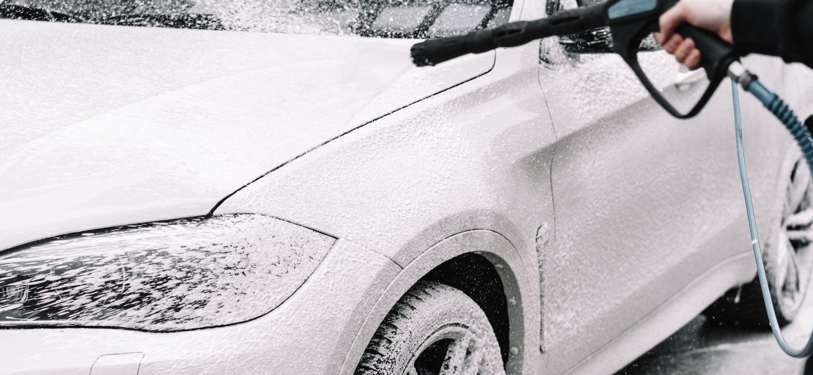 car sprayed with foam soap