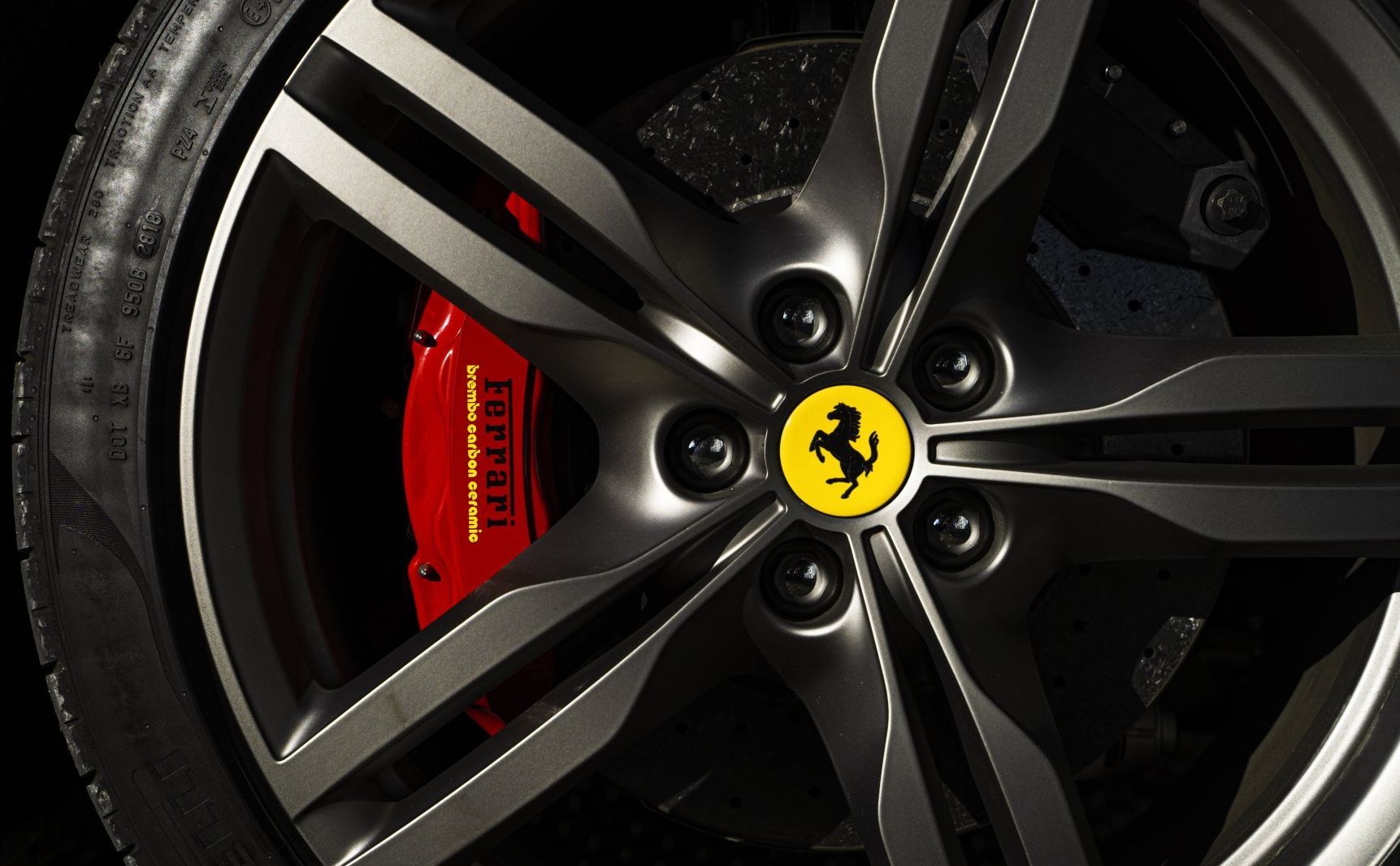 picture of a Ferrari wheel that is clean and shiny