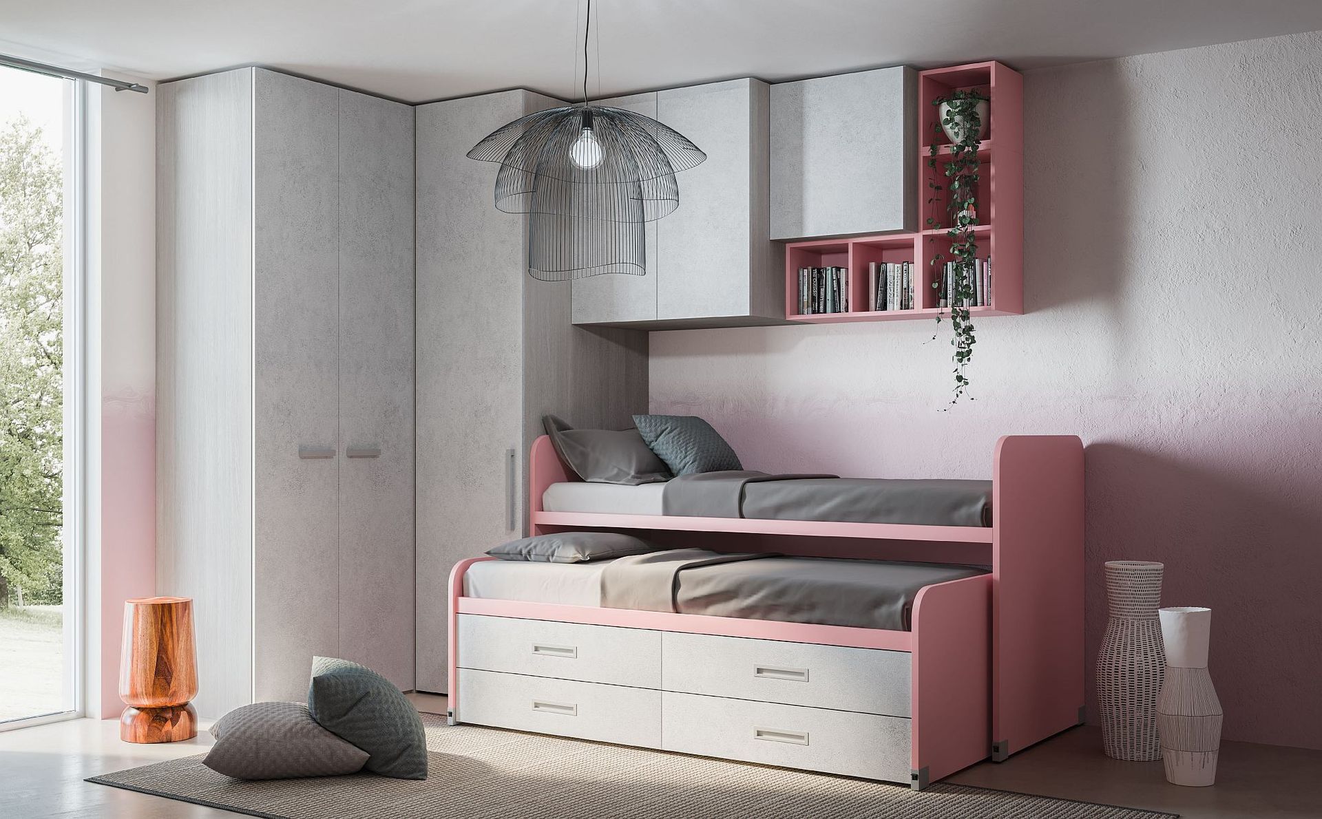 Una camera da letto con un letto a castello rosa e un armadio bianco