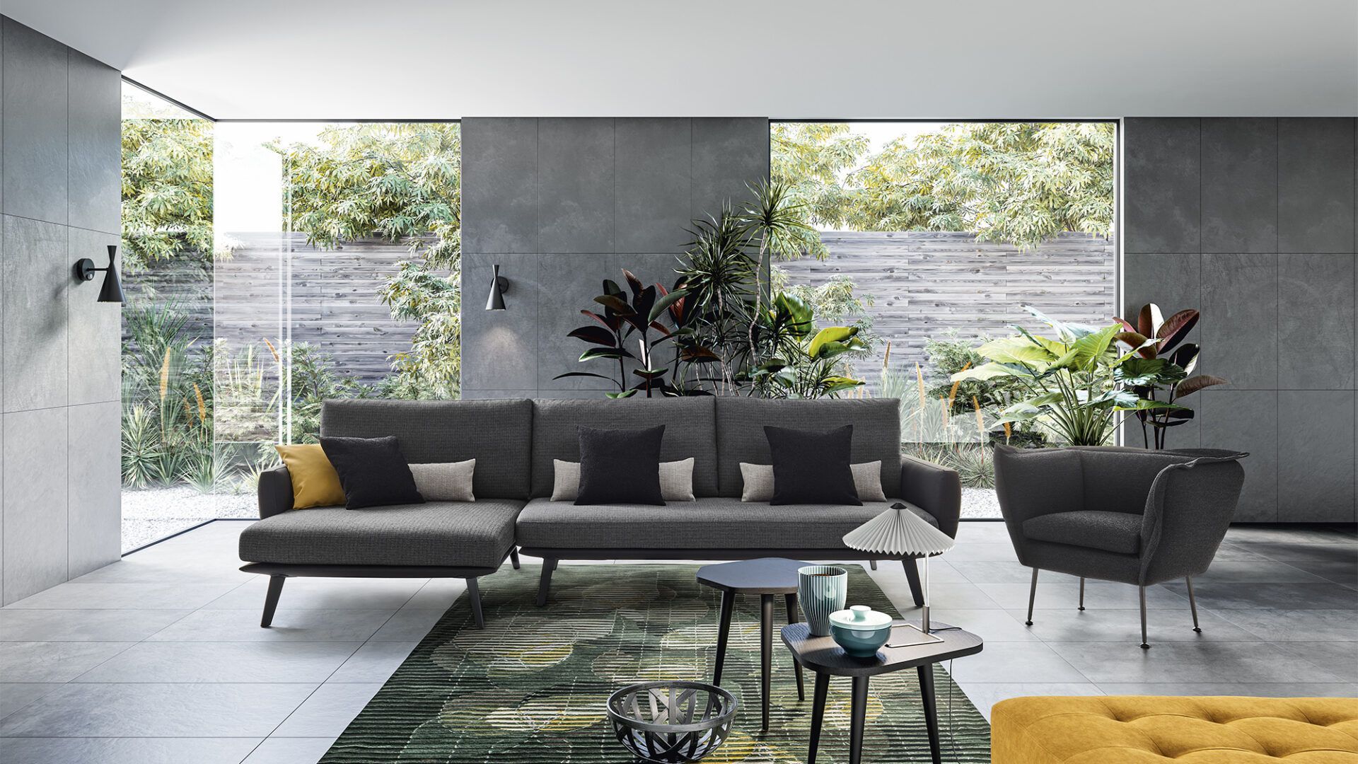 Un soggiorno con un divano e una sedia