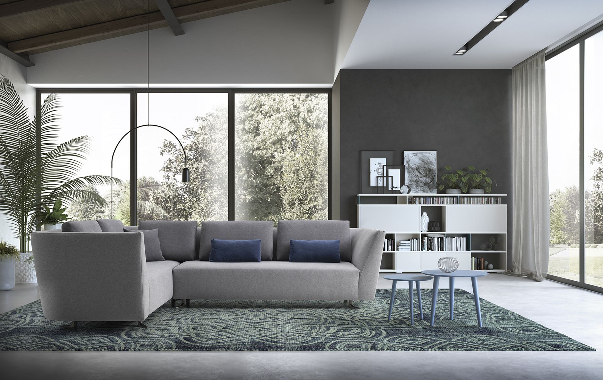 Un soggiorno con un grande divano componibile e un tappeto