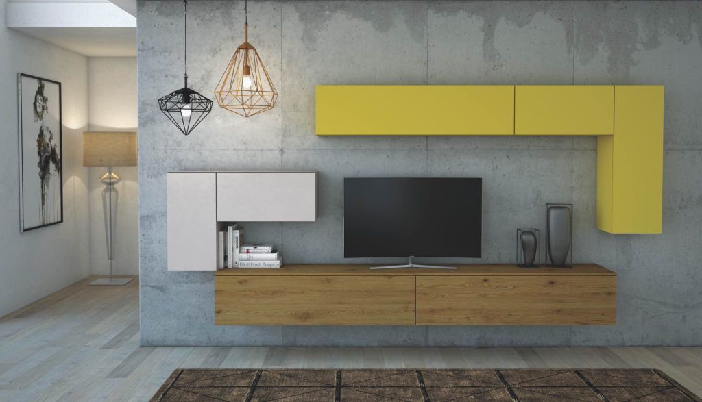 Un soggiorno con mobili gialli e bianchi e una TV a schermo piatto