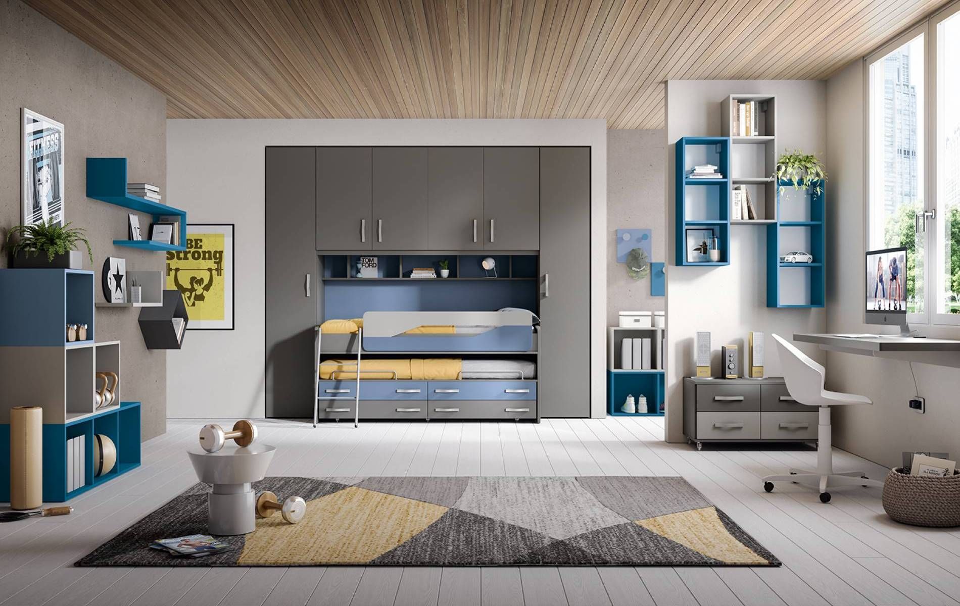 Una camera con un letto a castello e una scrivania