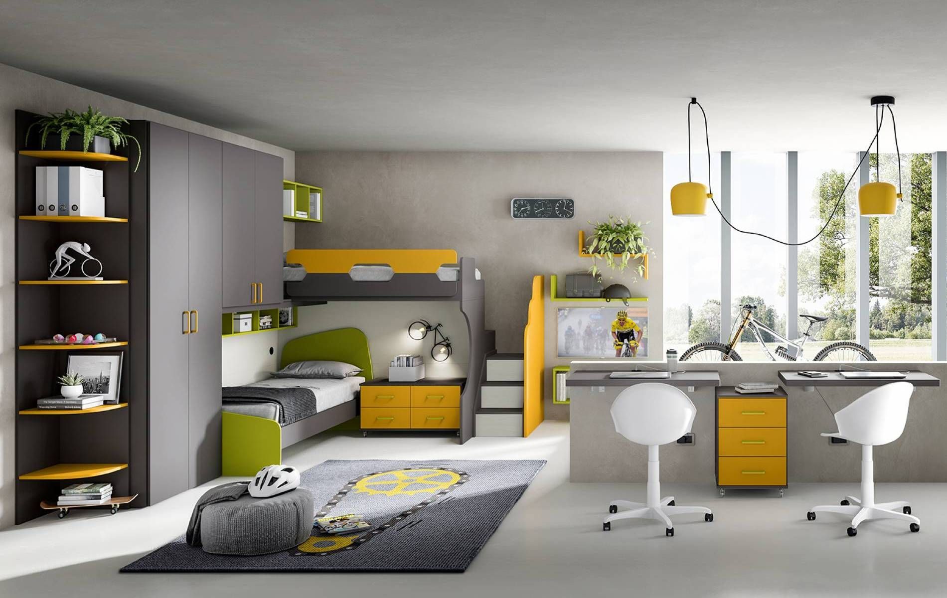 Una camera con un letto a castello e due scrivanie