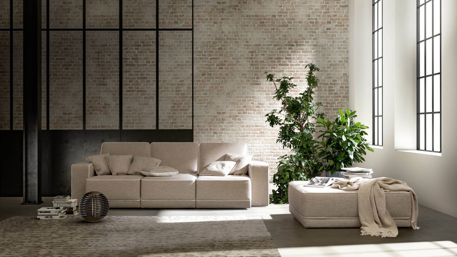 Un soggiorno con un muro di mattoni e un divano e un pouf