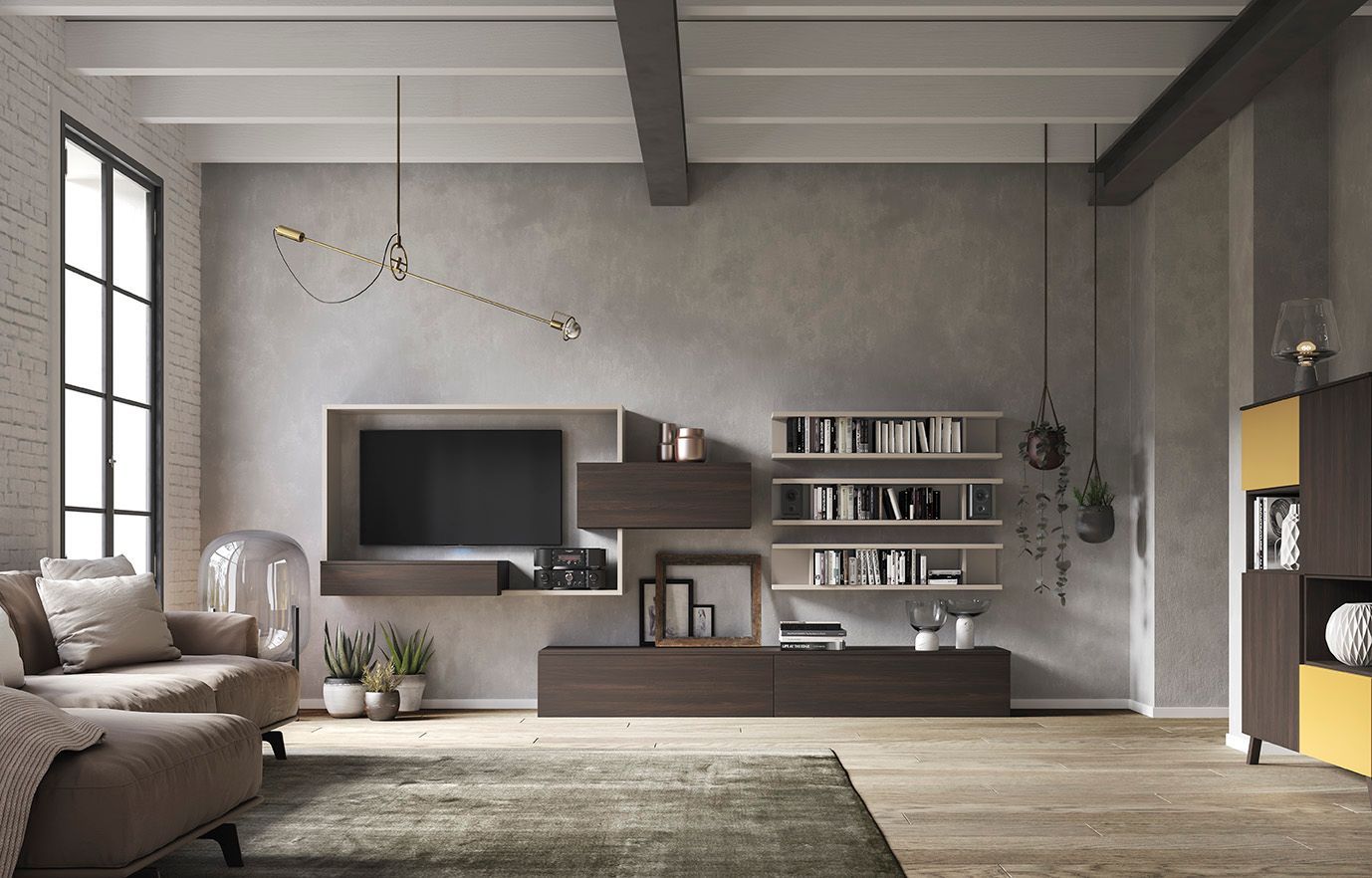 Un soggiorno con un divano e una televisione sulla parete.