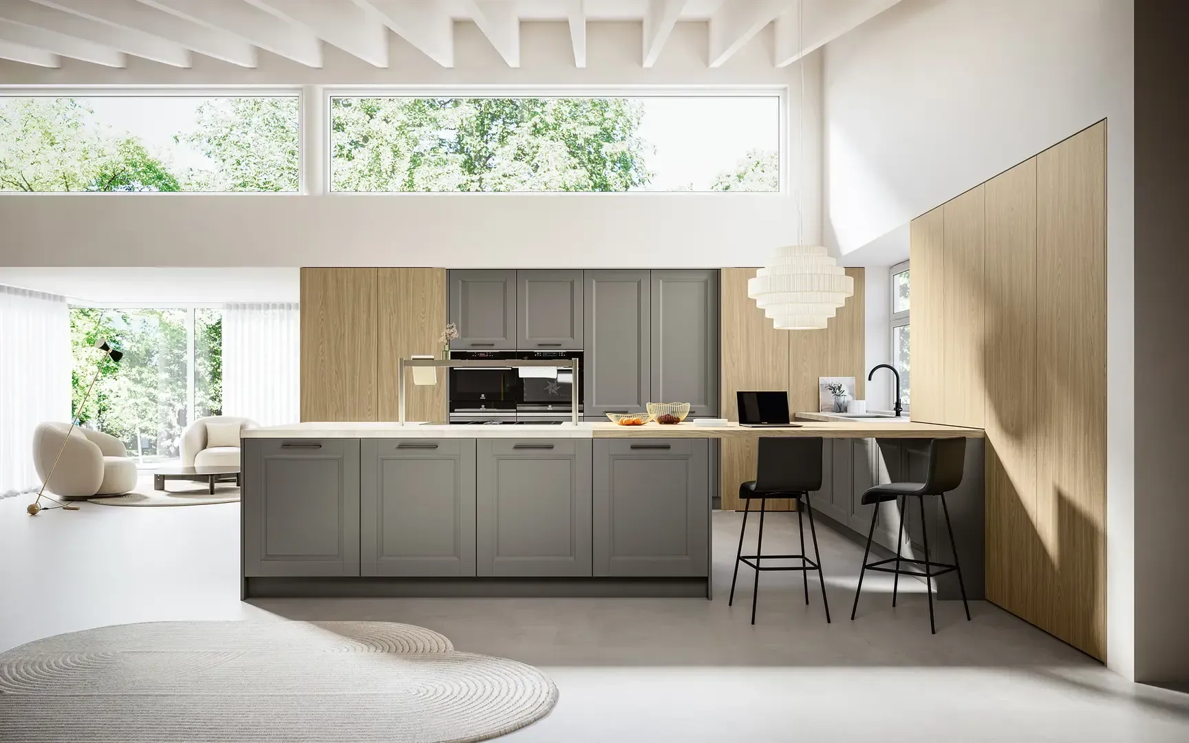 Una cucina con mobili grigi e un piano di lavoro in legno